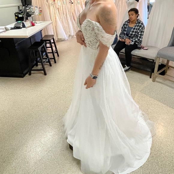 BRAND NEW - Beautiful, multiple ways to wear this wedding dress! - Picture 9 of 9